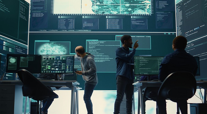 Governmental,Hackers,Analyzing,Cyber,Threats,On,Big,Screens,,Managing,Important